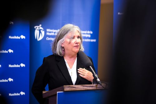 MIKAELA MACKENZIE / WINNIPEG FREE PRESS
Christine Dobbs, Moms Stop the Harm representative, reacts to the opening of a Rapid Access to Addictions Medicine clinic in Winnipeg on Wednesday, Sept. 5, 2018. 
Winnipeg Free Press 2018.