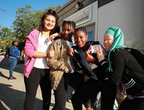 RUTH BONNEVILLE / WINNIPEG FREE PRESS 


Feature Story: Freedom International School on the first day of school.

Story: Volunteers converted an electrical shop on Notre Dame Ave. into a school  for newcomer kids ages 13-21 whose reading and basic academic skills are at least two years behind their Canadian peers. 
Former police chief Devon Clunis gave opening blessing to volunteer teachers and approx. 20 students.   

Names: L - R
Gabrielle Gonzalez, Plamedie Gatoro, Christina Dusabimana and Jackline Bikorimana are all smiles outside their new school Wednesday. 

Carol Sanders  | Reporter

September 5/18 
