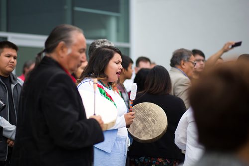 MIKAELA MACKENZIE / WINNIPEG FREE PRESS
Students and special guests take part in a ceremony around the ceremonial fire pit to mark the official opening of the expanded campus of Southeast Collegiate, a secondary school that welcomes First Nations students from communities across Manitoba, in Winnipeg on Thursday, Sept. 6, 2018. 
Winnipeg Free Press 2018.