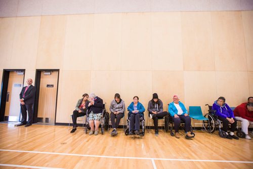 MIKAELA MACKENZIE / WINNIPEG FREE PRESS
Elders and students sit along the wall at the grand opening of the expanded campus of Southeast Collegiate, a secondary school that welcomes First Nations students from communities across Manitoba, in Winnipeg on Thursday, Sept. 6, 2018. 
Winnipeg Free Press 2018.