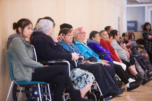 MIKAELA MACKENZIE / WINNIPEG FREE PRESS
Elders and students sit along the wall at the grand opening of the expanded campus of Southeast Collegiate, a secondary school that welcomes First Nations students from communities across Manitoba, in Winnipeg on Thursday, Sept. 6, 2018. 
Winnipeg Free Press 2018.