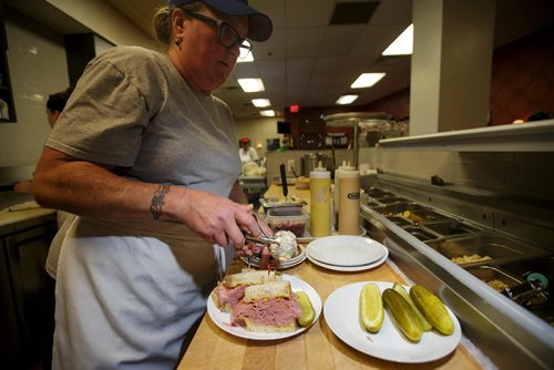 MIKE DEAL / WINNIPEG FREE PRESS
Nathan Detroit's Lunch Pad, 1 Lombard Place (directly beneath the Richardson Bldg/Fairmont Hotel) 
Holly Morris, catering specialist, prepares a ham sandwich.
180906 - Thursday, September 06, 2018.