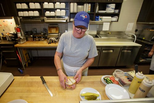 MIKE DEAL / WINNIPEG FREE PRESS
Nathan Detroit's Lunch Pad, 1 Lombard Place (directly beneath the Richardson Bldg/Fairmont Hotel) 
Holly Morris, catering specialist, prepares a ham sandwich.
180906 - Thursday, September 06, 2018.