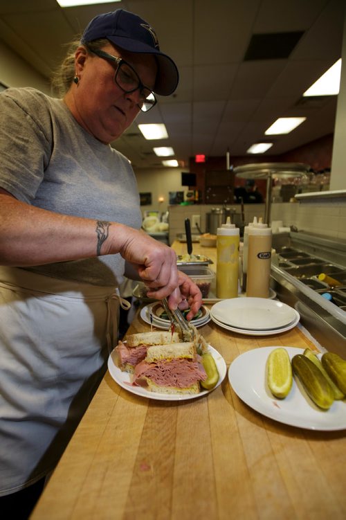 MIKE DEAL / WINNIPEG FREE PRESS
Nathan Detroit's Lunch Pad, 1 Lombard Place (directly beneath the Richardson Bldg/Fairmont Hotel) 
Holly Morris, catering specialist, prepares a ham sandwich.
180906 - Thursday, September 06, 2018.