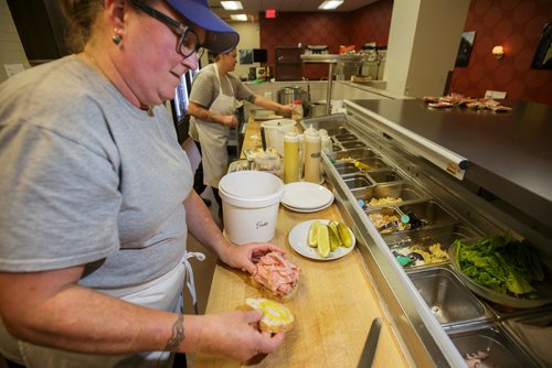 MIKE DEAL / WINNIPEG FREE PRESS
Nathan Detroit's Lunch Pad, 1 Lombard Place (directly beneath the Richardson Bldg/Fairmont Hotel) 
Holly Morris, catering specialist, prepares a ham sandwich.
180906 - Thursday, September 06, 2018.