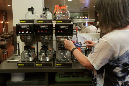 MIKE DEAL / WINNIPEG FREE PRESS
Nathan Detroit's Lunch Pad, 1 Lombard Place (directly beneath the Richardson Bldg/Fairmont Hotel) 
Karen Yamron-Shpeller puts another pot of coffee on.
180906 - Thursday, September 06, 2018.