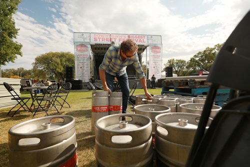 RUTH BONNEVILLE / WINNIPEG FREE PRESS 

Standup photo 
Rob Dokuchie, with Lake of the Woods Brewing Company, moves barrels Thursday during set up for this years Many Fest which takes place Sept 7 & 8 along Broadway an in Memorial Park. 

Standup photo 


September 6/18 
