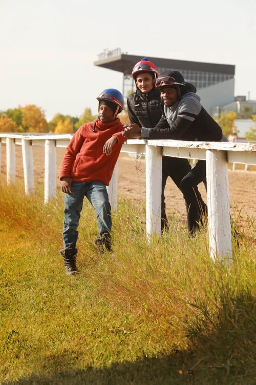 RUTH BONNEVILLE / WINNIPEG FREE PRESS 

Sports
Downs Jockeys, (from right front to left rear), Antonio Whitehall, Prayven Badrie and Renaldo Cumberbatch pose for group photo at Assiniboia Downs training track.

See George Williams story on battle for jockey title comes down to the wire.


September 6/18 

