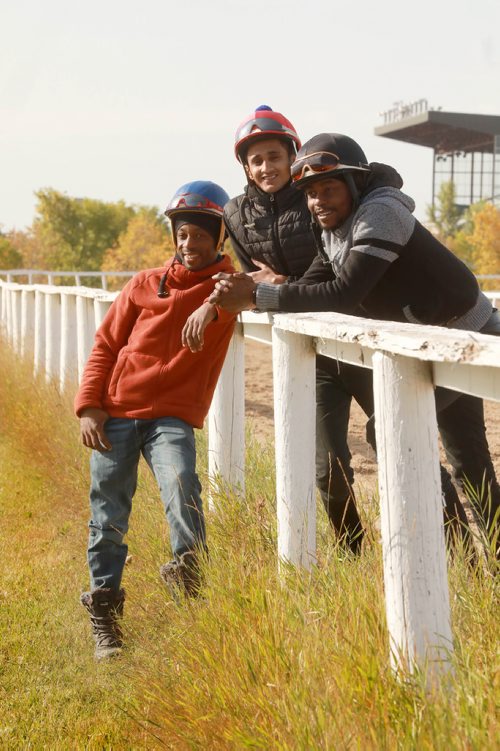 RUTH BONNEVILLE / WINNIPEG FREE PRESS 

Sports
Downs Jockeys, (from right front to left rear), Antonio Whitehall, Prayven Badrie and Renaldo Cumberbatch pose for group photo at Assiniboia Downs training track.

See George Williams story on battle for jockey title comes down to the wire.


September 6/18 
