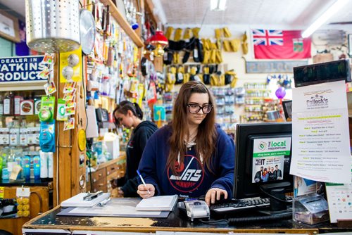 MIKAELA MACKENZIE / WINNIPEG FREE PRESS
Anna Krulicki, co-manager, places an order at Pollock's Co-op on Main Street in Winnipeg on Thursday, Sept. 6, 2018. 
Winnipeg Free Press 2018.