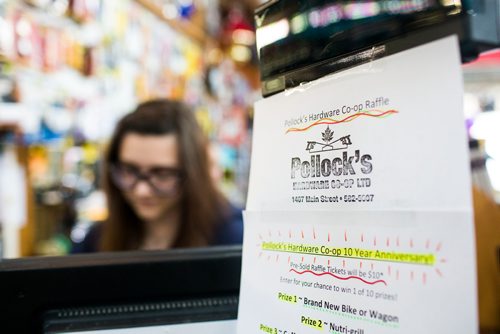 MIKAELA MACKENZIE / WINNIPEG FREE PRESS
Anna Krulicki, co-manager, places an order at Pollock's Co-op on Main Street in Winnipeg on Thursday, Sept. 6, 2018. 
Winnipeg Free Press 2018.