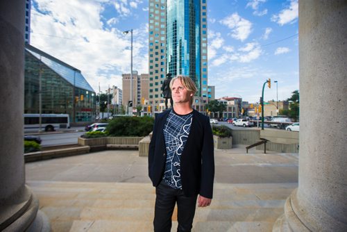 MIKAELA MACKENZIE / WINNIPEG FREE PRESS
Brent Bellamy, architect and active advocate for opening Portage and Main to pedestrians, poses for a portrait at the famed intersection in Winnipeg on Thursday, Sept. 6, 2018. 
Winnipeg Free Press 2018.