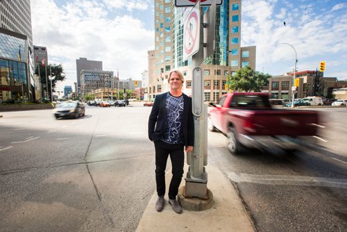 MIKAELA MACKENZIE / WINNIPEG FREE PRESS
Brent Bellamy, architect and active advocate for opening Portage and Main to pedestrians, poses for a portrait at the famed intersection in Winnipeg on Thursday, Sept. 6, 2018. 
Winnipeg Free Press 2018.