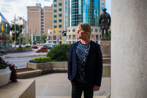 MIKAELA MACKENZIE / WINNIPEG FREE PRESS
Brent Bellamy, architect and active advocate for opening Portage and Main to pedestrians, poses for a portrait at the famed intersection in Winnipeg on Thursday, Sept. 6, 2018. 
Winnipeg Free Press 2018.