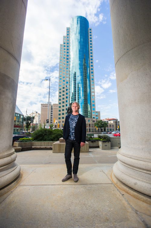 MIKAELA MACKENZIE / WINNIPEG FREE PRESS
Brent Bellamy, architect and active advocate for opening Portage and Main to pedestrians, poses for a portrait at the famed intersection in Winnipeg on Thursday, Sept. 6, 2018. 
Winnipeg Free Press 2018.