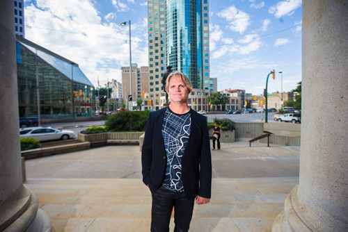 MIKAELA MACKENZIE / WINNIPEG FREE PRESS
Brent Bellamy, architect and active advocate for opening Portage and Main to pedestrians, poses for a portrait at the famed intersection in Winnipeg on Thursday, Sept. 6, 2018. 
Winnipeg Free Press 2018.