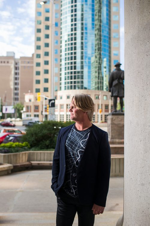 MIKAELA MACKENZIE / WINNIPEG FREE PRESS
Brent Bellamy, architect and active advocate for opening Portage and Main to pedestrians, poses for a portrait at the famed intersection in Winnipeg on Thursday, Sept. 6, 2018. 
Winnipeg Free Press 2018.