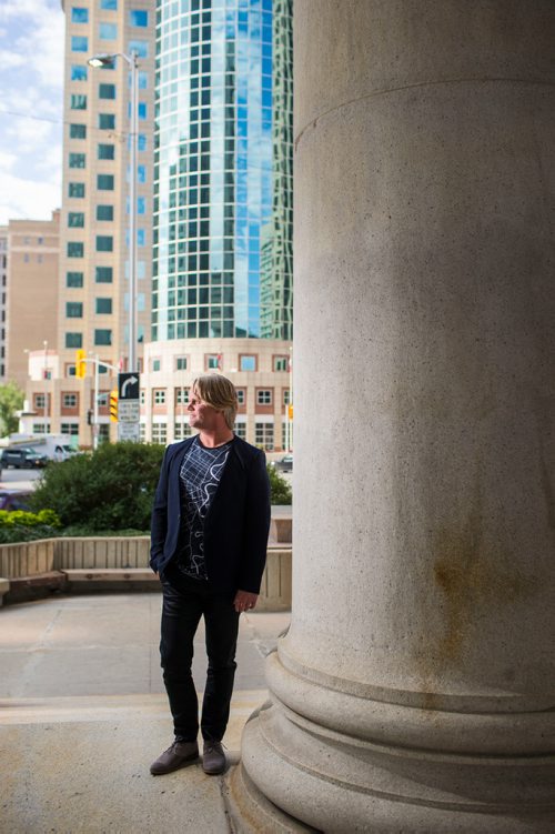 MIKAELA MACKENZIE / WINNIPEG FREE PRESS
Brent Bellamy, architect and active advocate for opening Portage and Main to pedestrians, poses for a portrait at the famed intersection in Winnipeg on Thursday, Sept. 6, 2018. 
Winnipeg Free Press 2018.