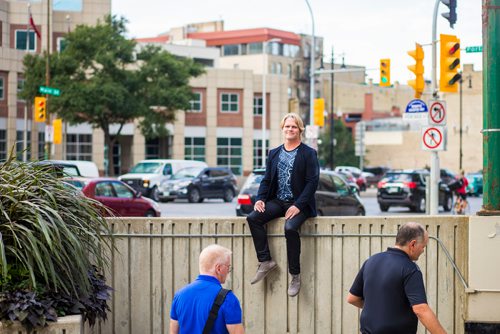 MIKAELA MACKENZIE / WINNIPEG FREE PRESS
Brent Bellamy, architect and active advocate for opening Portage and Main to pedestrians, poses for a portrait at the famed intersection in Winnipeg on Thursday, Sept. 6, 2018. 
Winnipeg Free Press 2018.