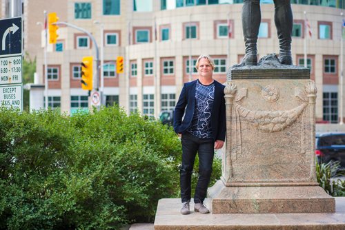 MIKAELA MACKENZIE / WINNIPEG FREE PRESS
Brent Bellamy, architect and active advocate for opening Portage and Main to pedestrians, poses for a portrait at the famed intersection in Winnipeg on Thursday, Sept. 6, 2018. 
Winnipeg Free Press 2018.