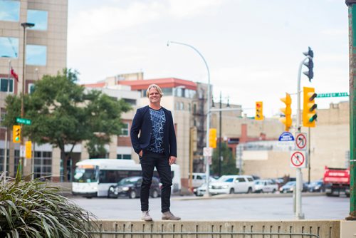 MIKAELA MACKENZIE / WINNIPEG FREE PRESS
Brent Bellamy, architect and active advocate for opening Portage and Main to pedestrians, poses for a portrait at the famed intersection in Winnipeg on Thursday, Sept. 6, 2018. 
Winnipeg Free Press 2018.