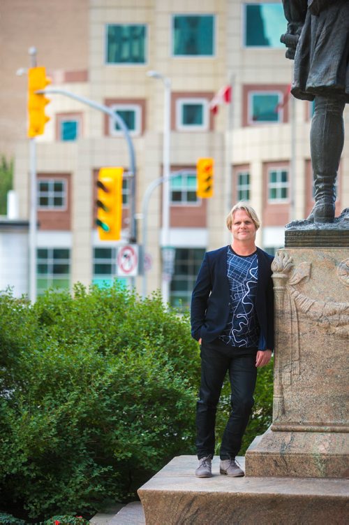 MIKAELA MACKENZIE / WINNIPEG FREE PRESS
Brent Bellamy, architect and active advocate for opening Portage and Main to pedestrians, poses for a portrait at the famed intersection in Winnipeg on Thursday, Sept. 6, 2018. 
Winnipeg Free Press 2018.