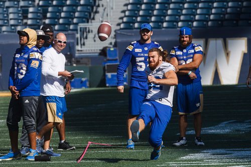 MIKE DEAL / WINNIPEG FREE PRESS
Winnipeg Blue Bombers' full-back John Rush (32) kicks a field goal from the 35 yard line during practice at Investors Group Field Friday morning.
180907 - Friday, September 07, 2018.