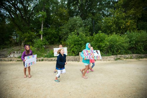 MIKAELA MACKENZIE / WINNIPEG FREE PRESS
Fans cheer on the bank of the river at the seventh annual Manitoba Dragon Boat Festival in support of the CancerCare Manitoba Foundation and the Childrens Hospital Foundation of Manitoba takes place at the Forks in Winnipeg on Saturday, Sept. 8, 2018. 
Winnipeg Free Press 2018.