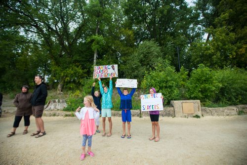 MIKAELA MACKENZIE / WINNIPEG FREE PRESS
Fans cheer on the bank of the river at the seventh annual Manitoba Dragon Boat Festival in support of the CancerCare Manitoba Foundation and the Childrens Hospital Foundation of Manitoba takes place at the Forks in Winnipeg on Saturday, Sept. 8, 2018. 
Winnipeg Free Press 2018.