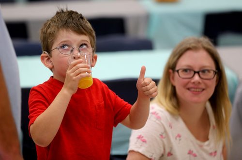 TREVOR HAGAN / WINNIPEG FREE PRESS
Mathew Spears, 7, a cochlear implant recipient, with his mother, Erin, Sunday, September 9, 2018, 2018. Mathew is one of more than 200 patients who gathered at Waverly Heights Community Centre to celebrate after HSC Surgical Hearing Implant Program reached the milestone of having performed 250 implants.