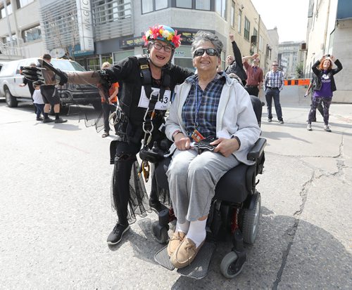 JASON HALSTEAD / WINNIPEG FREE PRESS

L-R: Society for Manitobans with Disabilities (SMD) Foundation/Easter Seals Manitoba board member Judy Wasyslycia-Leis has a laugh before her rappel with event supporter Stephany Cholakis at the 14th Annual Easter Seals Drop Zone, a fundraising event in support of the SMD, at the Manitoba Hydro Building in Downtown Winnipeg on Aug. 28, 2018. (See Social Page)