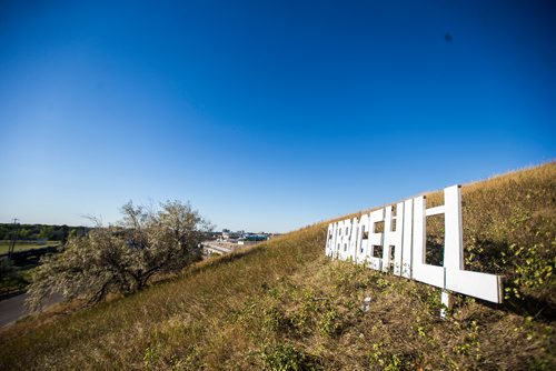 MIKAELA MACKENZIE / WINNIPEG FREE PRESS
A Hollywood-esque sign marks Garbage Hill in Winnipeg on Monday, Sept. 10, 2018. 
Winnipeg Free Press 2018.