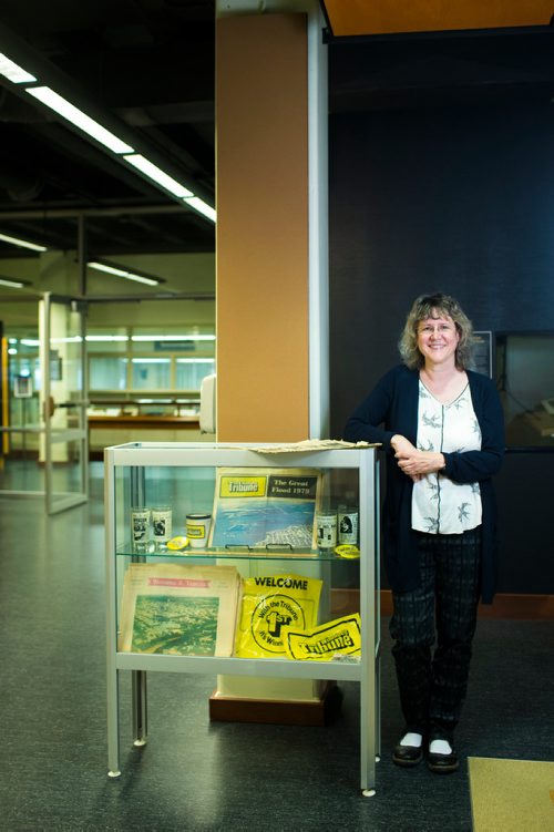 MIKAELA MACKENZIE / WINNIPEG FREE PRESS
Archivist Shelley Sweeney poses with copies of the Winnipeg Tribune at the University of Manitoba archives in Winnipeg on Monday, Sept. 10, 2018.  The university has completely digitized the newspaper, which was in operation from 1890 to August 1980.
Winnipeg Free Press 2018.