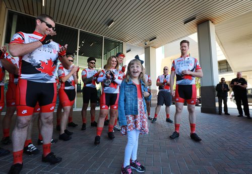 RUTH BONNEVILLE / WINNIPEG FREE PRESS 

Standup Photo (several photo options)

Seven-year-old Hope Innis, Children's Wish Foundation's poster child, is all smiles as she has her photo taken with a group of Winnipeg Police Service volunteer cyclist taking part  Cops for Kids Relay Team  just before the   start of their True Grit Tour, a 3000 km bike ride to Tucson, Arizona, at  WPS Headquarters Monday.
 
All money raised from the tours go directly to granting the Wishes of children with life-threatening illnesses through The Childrens Wish Foundation. It is with limitless courage and bravery that these children face daily or lifetime treatments along with the reality that their life may be unfortunately cut short.
 


September 10/18 

