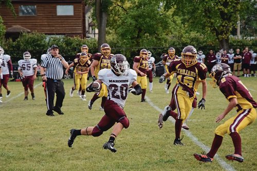 Canstar Community News Sept. 6 - The Daniel McIntyre Maroons take on the Portage Collegiate Trojans at home during the 2018 WHSFL season opener. (EVA WASNEY/CANSTAR COMMUNITY NEWS/METRO)