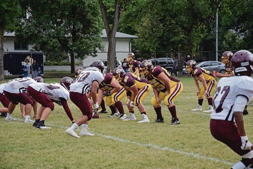 Canstar Community News Sept. 6 - The Portage Trojans take on the Daniel McIntyre Maroons in the 2018 WHSFL season opener. (EVA WASNEY/CANSTAR COMMUNITY NEWS)