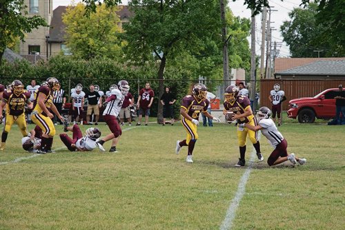 Canstar Community News Sept. 6 - The Portage Trojans take on the Daniel McIntyre Maroons in the 2018 WHSFL season opener. (EVA WASNEY/CANSTAR COMMUNITY NEWS)