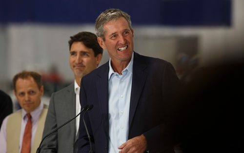 MIKE DEAL / WINNIPEG FREE PRESS
Prime Minister Justin Trudeau looks on while Manitoba Premier Brian Pallister talks during a press conference at a new 700 employee Canada Goose manufacturing facility in Winnipeg. 
180911 - Tuesday, September 11, 2018.