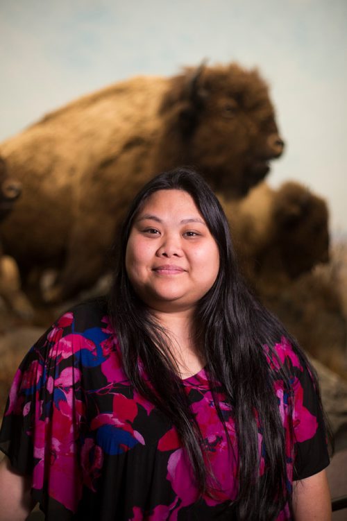 MIKAELA MACKENZIE / WINNIPEG FREE PRESS
 Janine Orcullo, who volunteers in the human resources department at the Manitoba Museum, poses at the museum in Winnipeg on Thursday, Sept. 13, 2018.  
Winnipeg Free Press 2018.