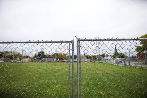 MIKAELA MACKENZIE / WINNIPEG FREE PRESS
The concrete play area is fenced off from the field after the field was found to have more than 1,000 mg/g lead levels in some parts at Weston School in Winnipeg on Thursday, Sept. 13, 2018.  
Winnipeg Free Press 2018.