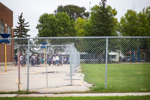 MIKAELA MACKENZIE / WINNIPEG FREE PRESS
Students are restricted to the concrete play area after the field was found to have more than 1,000 mg/g lead levels in some parts at Weston School in Winnipeg on Thursday, Sept. 13, 2018.  
Winnipeg Free Press 2018.