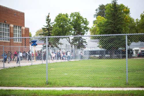 MIKAELA MACKENZIE / WINNIPEG FREE PRESS
Students are restricted to the concrete play area after the field was found to have more than 1,000 mg/g lead levels in some parts at Weston School in Winnipeg on Thursday, Sept. 13, 2018.  
Winnipeg Free Press 2018.