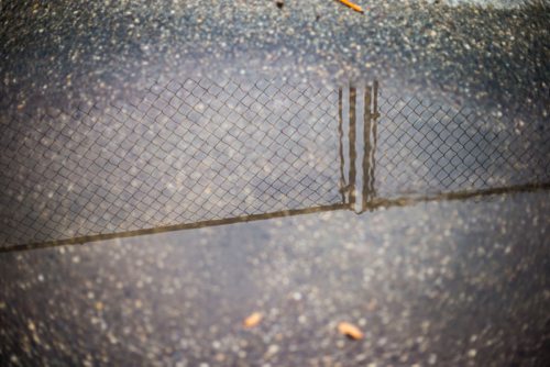 MIKAELA MACKENZIE / WINNIPEG FREE PRESS
The concrete play area is fenced off from the field after the field was found to have more than 1,000 mg/g lead levels in some parts at Weston School in Winnipeg on Thursday, Sept. 13, 2018.  
Winnipeg Free Press 2018.