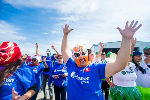 MIKAELA MACKENZIE / WINNIPEG FREE PRESS
Abraham Tassia warms up at the United Way plane pull challenge at the Red River College Stevenson Campus in Winnipeg on Friday, Sept. 14, 2018.  
Winnipeg Free Press 2018.