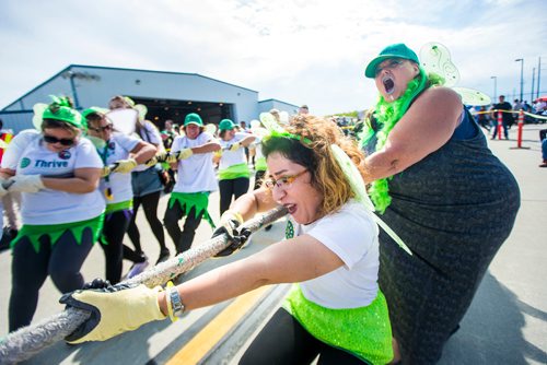 MIKAELA MACKENZIE / WINNIPEG FREE PRESS
Mina Khani (left) and Cynthia-Moon Weidl pull with the Thrive Community Support Circle team at the United Way plane pull challenge at the Red River College Stevenson Campus in Winnipeg on Friday, Sept. 14, 2018.  
Winnipeg Free Press 2018.