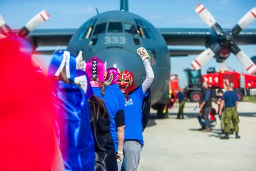 MIKAELA MACKENZIE / WINNIPEG FREE PRESS
The Johnston Group team celebrates at the United Way plane pull challenge at the Red River College Stevenson Campus in Winnipeg on Friday, Sept. 14, 2018.  
Winnipeg Free Press 2018.