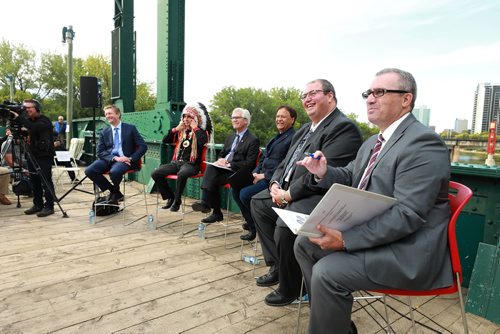 RUTH BONNEVILLE / WINNIPEG FREE PRESS 


The Government of Canada announces support for acquisition and repair of Churchill rail line by Arctic Gateway Group at press conference  held on the Forks historic bridge Friday.

Key players in attendance answer questions from the media after presser.  
Names from left: 
Fairfax President Paul Rivett, Grand Chief Arlen Dumas, 
MP Jim Carr (Minister of International Trade Diversification), mayor of Churchill Mike Spence, AGT Food Inc. director of corporate affairs Omer Al-Katib and Chuck Davidson (MB Chamber of Commerce) who was the emcee. 

See Martin Cash story. 

September 14/18 
