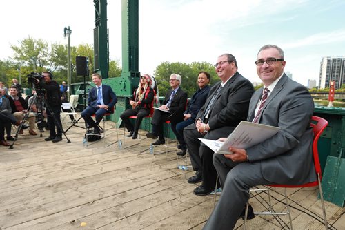 RUTH BONNEVILLE / WINNIPEG FREE PRESS 


The Government of Canada announces support for acquisition and repair of Churchill rail line by Arctic Gateway Group at press conference  held on the Forks historic bridge Friday.

Key players in attendance answer questions from the media after presser.  
Names from left: 
Fairfax President Paul Rivett, Grand Chief Arlen Dumas, 
MP Jim Carr (Minister of International Trade Diversification), mayor of Churchill Mike Spence, AGT Food Inc. director of corporate affairs Omer Al-Katib and Chuck Davidson (MB Chamber of Commerce) who was the emcee. 

See Martin Cash story. 

September 14/18 
