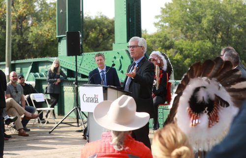 RUTH BONNEVILLE / WINNIPEG FREE PRESS 


The Government of Canada announces support for acquisition and repair of Churchill rail line by Arctic Gateway Group at press conference  held on the Forks historic bridge Friday.

Photo of MP Jim Carr (Minister of International Trade Diversification) at podium.

Key players in attendance were:
MP Jim Carr (Minister of International Trade Diversification), Grand Chief Arlen Dumas, Fairfax President Paul Rivett, mayor of Churchill Mike Spence and AGT Food Inc. director of corporate affairs Omer Al-Katib. 

See Martin Cash story. 

September 14/18 
