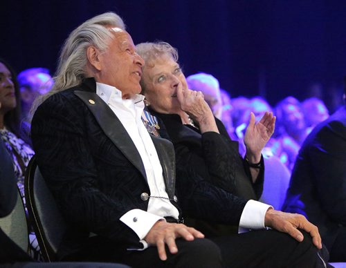 JASON HALSTEAD / WINNIPEG FREE PRESS

Peter Nygard takes in the fashion show with former Manitoba Lt.-Gov. Pearl McGonigal at the Nygard 50 Years in Fashion gala at the RBC Convention Centre Winnipeg on Sept. 14, 2018. (See Prest story)